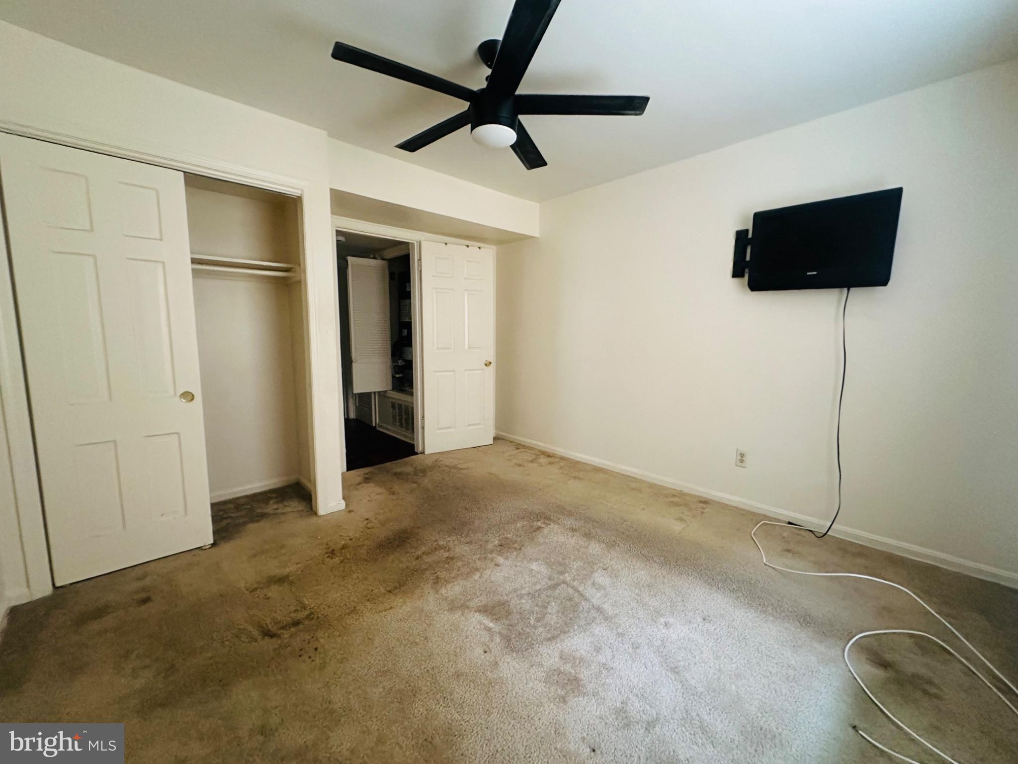 2013 37th Street Southeast Washington, DC 20020 - Photo 3 of 6 Spacious room with modern ceiling fan.