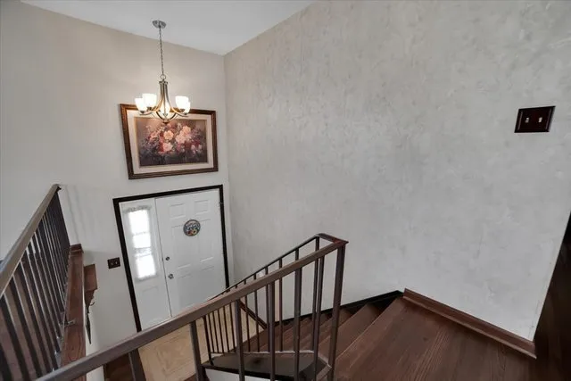 a view of a hallway with front door