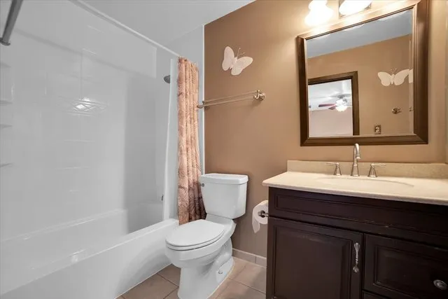 a bathroom with a toilet a sink and a bathtub