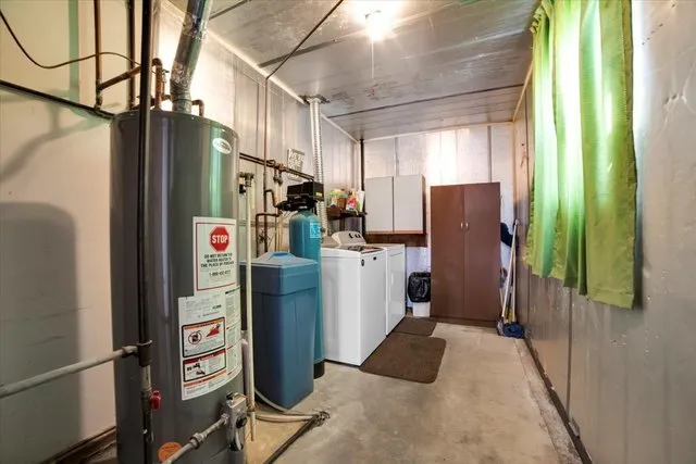 a view of refrigerator with washer and dryer