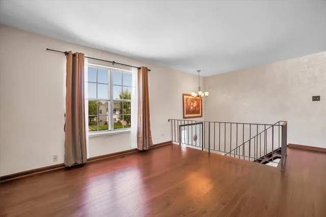 a view of livingroom with furniture wooden floor and window