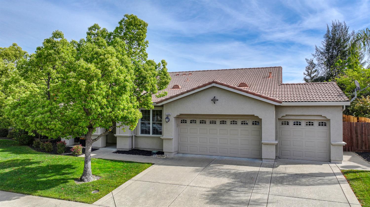 5966 Tanus Circle Rocklin, CA 95677 - Photo 1 of 38 a front view of a house with a yard and garage