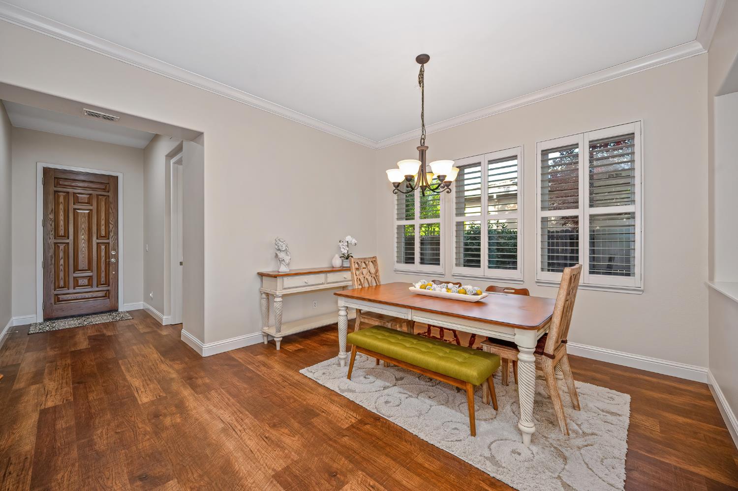 5966 Tanus Circle Rocklin, CA 95677 - Photo 12 of 38 a view of a workspace with furniture window and wooden floor