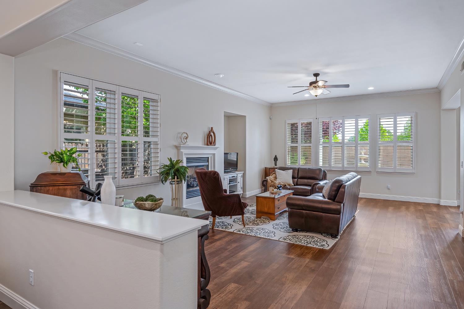 5966 Tanus Circle Rocklin, CA 95677 - Photo 15 of 38 a living room with furniture and wooden floor
