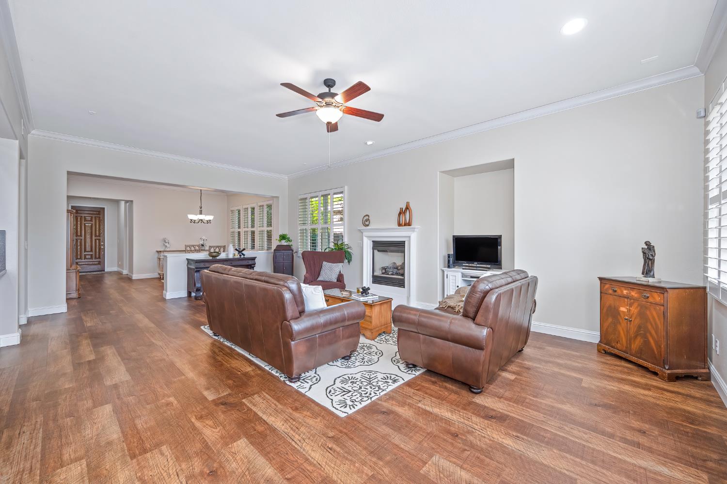 5966 Tanus Circle Rocklin, CA 95677 - Photo 17 of 38 a living room with furniture and a flat screen tv