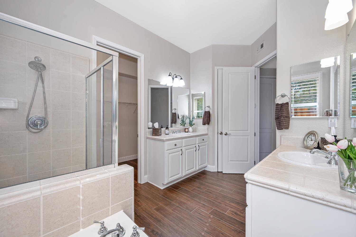 5966 Tanus Circle Rocklin, CA 95677 - Photo 29 of 38 a bathroom with a sink a toilet and shower
