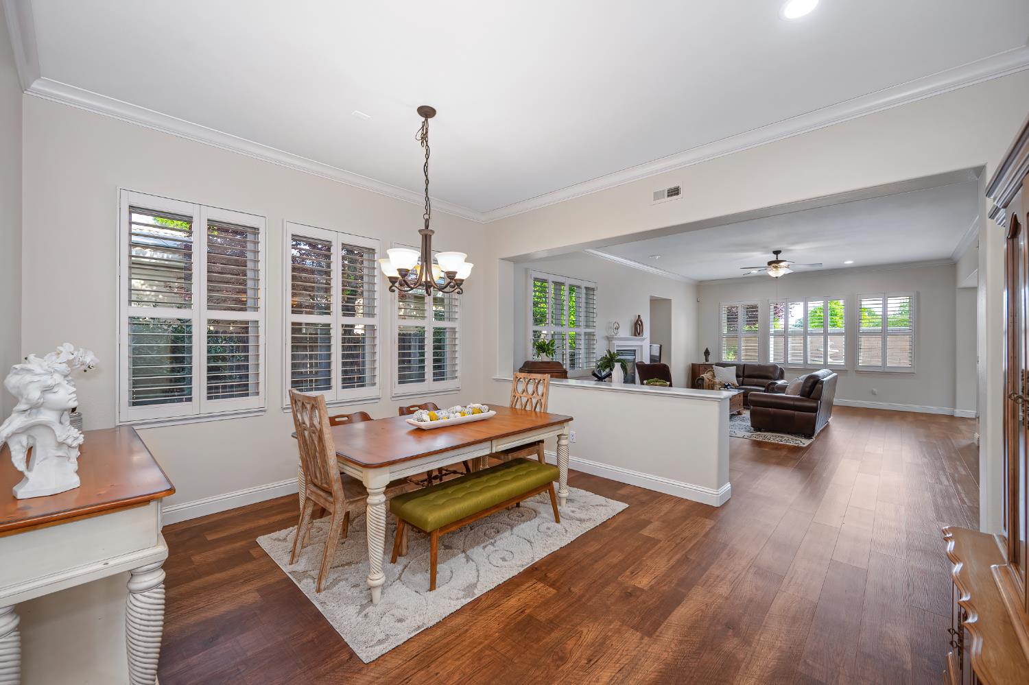 5966 Tanus Circle Rocklin, CA 95677 - Photo 4 of 38 a living room with furniture and wooden floor
