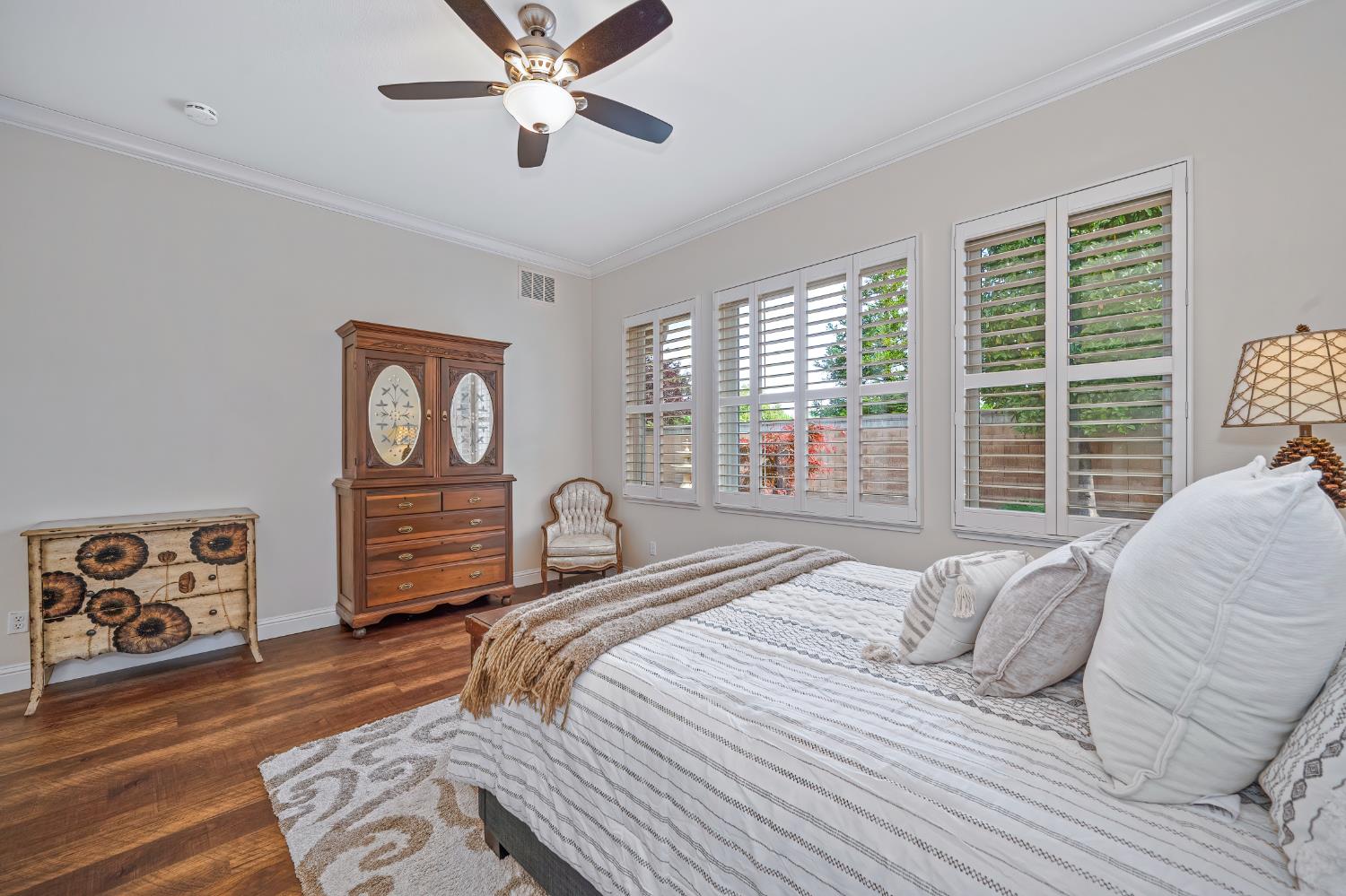 5966 Tanus Circle Rocklin, CA 95677 - Photo 5 of 38 a bedroom with a large bed and a window