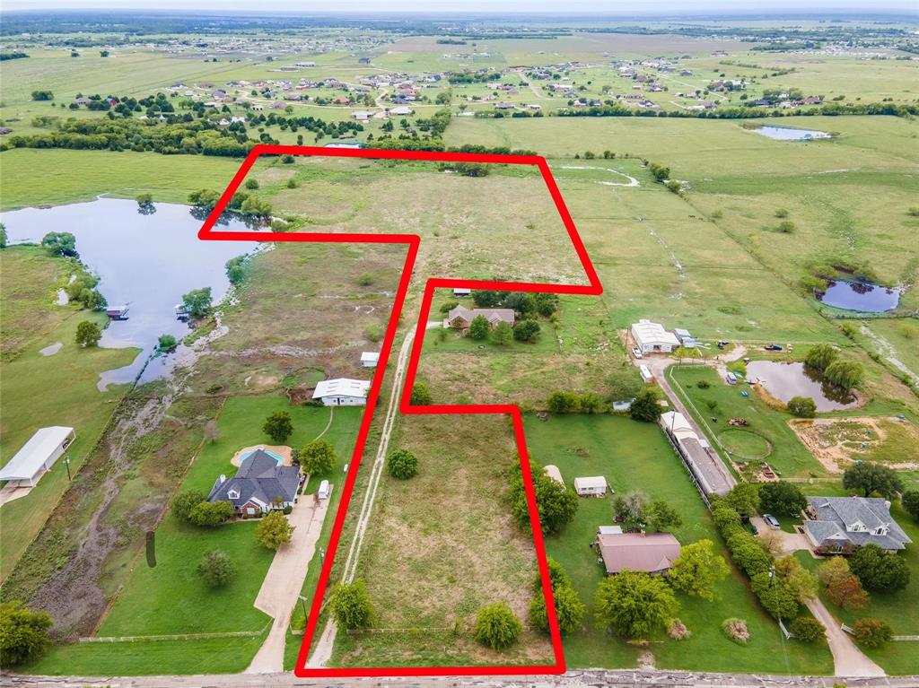 a view of swimming pool with a yard and seating