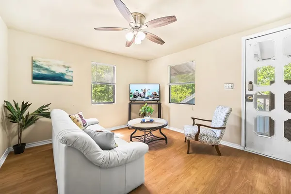 a living room with furniture and window