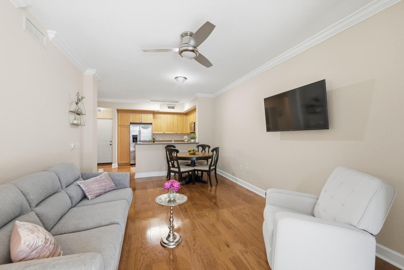 4 Renaissance Way, Unit 110 Boynton Beach, FL 33426 - Photo 19 of 26 a living room with furniture and a flat screen tv