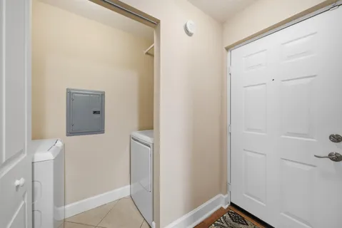 a bathroom with a shower and a sink