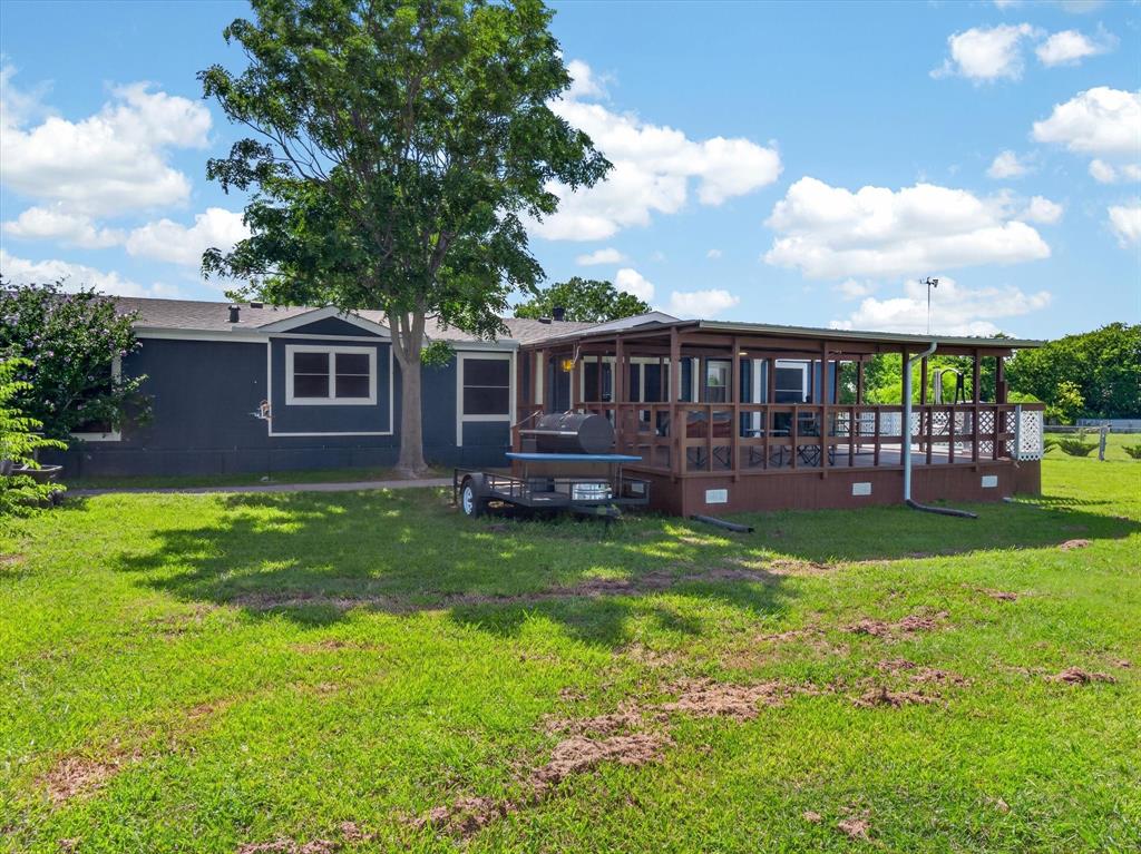 13051 Cherokee Road Sanger, TX 76266 - Photo 1 of 40 Well maintained manufactured home on one acre