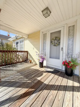 a view of a porch and a patio