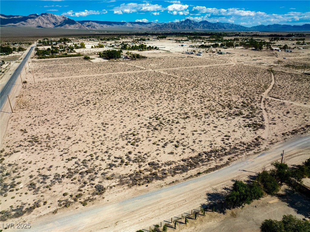 Marble Sandy Valley, NV 89019 - Photo 27 of 31 Aerial view with a mountain view, a rural view, and view of desert