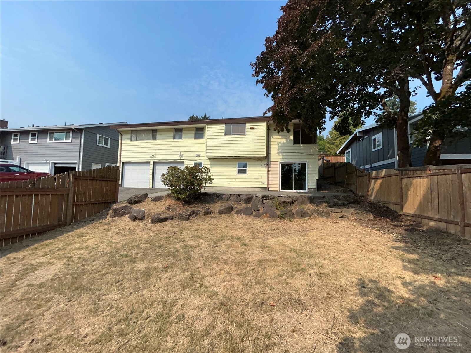 6605 South 127th Place Seattle, WA 98178 - Photo 38 of 38 a front view of a house with a yard