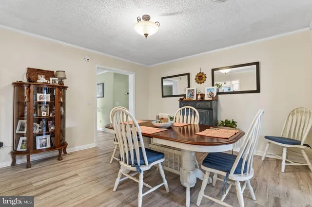 a kitchen with stainless steel appliances a refrigerator and a sink