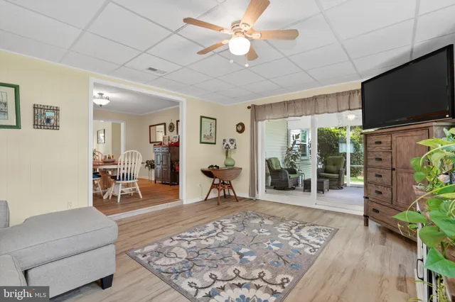 a bedroom with a bed and a tv