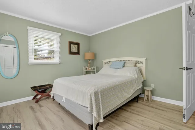 a bathroom with a bathtub a sink a vanity and a mirror
