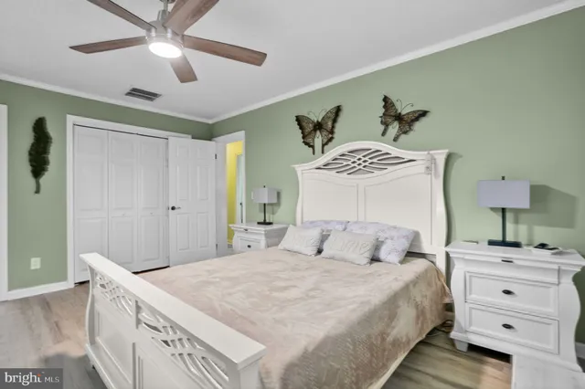 a bathroom with a sink mirror toilet and bathtub