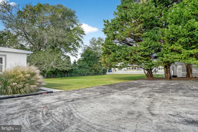 an aerial view of a house with a garden
