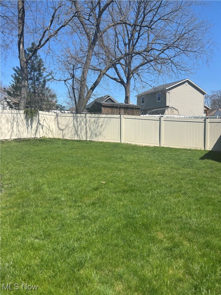819 Bridge Road Akron, OH 44312 - Photo 9 of 33 View of fully fenced back yard.