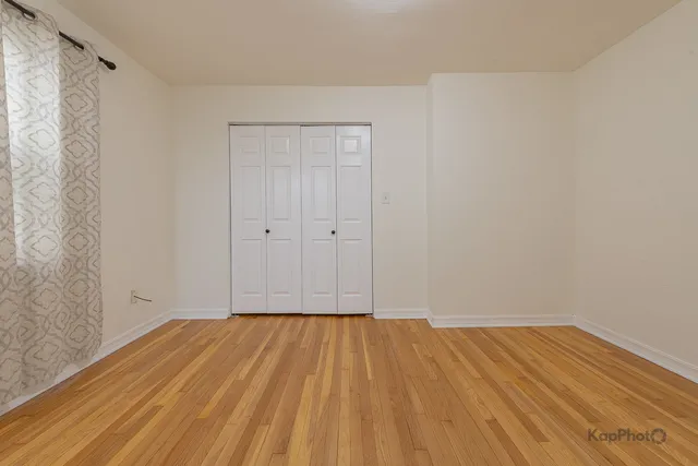 a view of small space with wooden floor