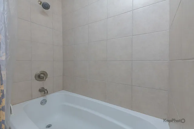 a bathroom with a bathtub