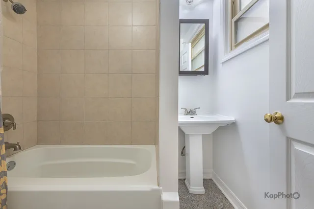 a bathroom with a sink and a bathtub