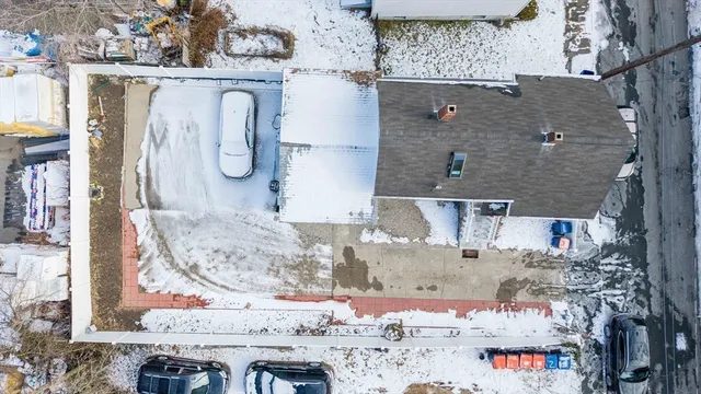 an aerial view of a house with a outdoor space