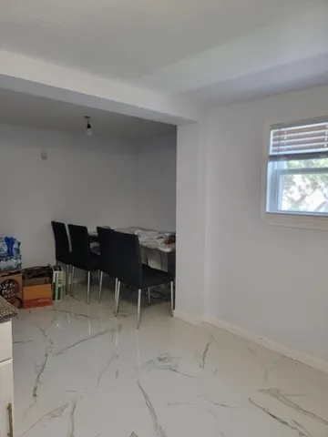 a view of a big room with chairs in a room