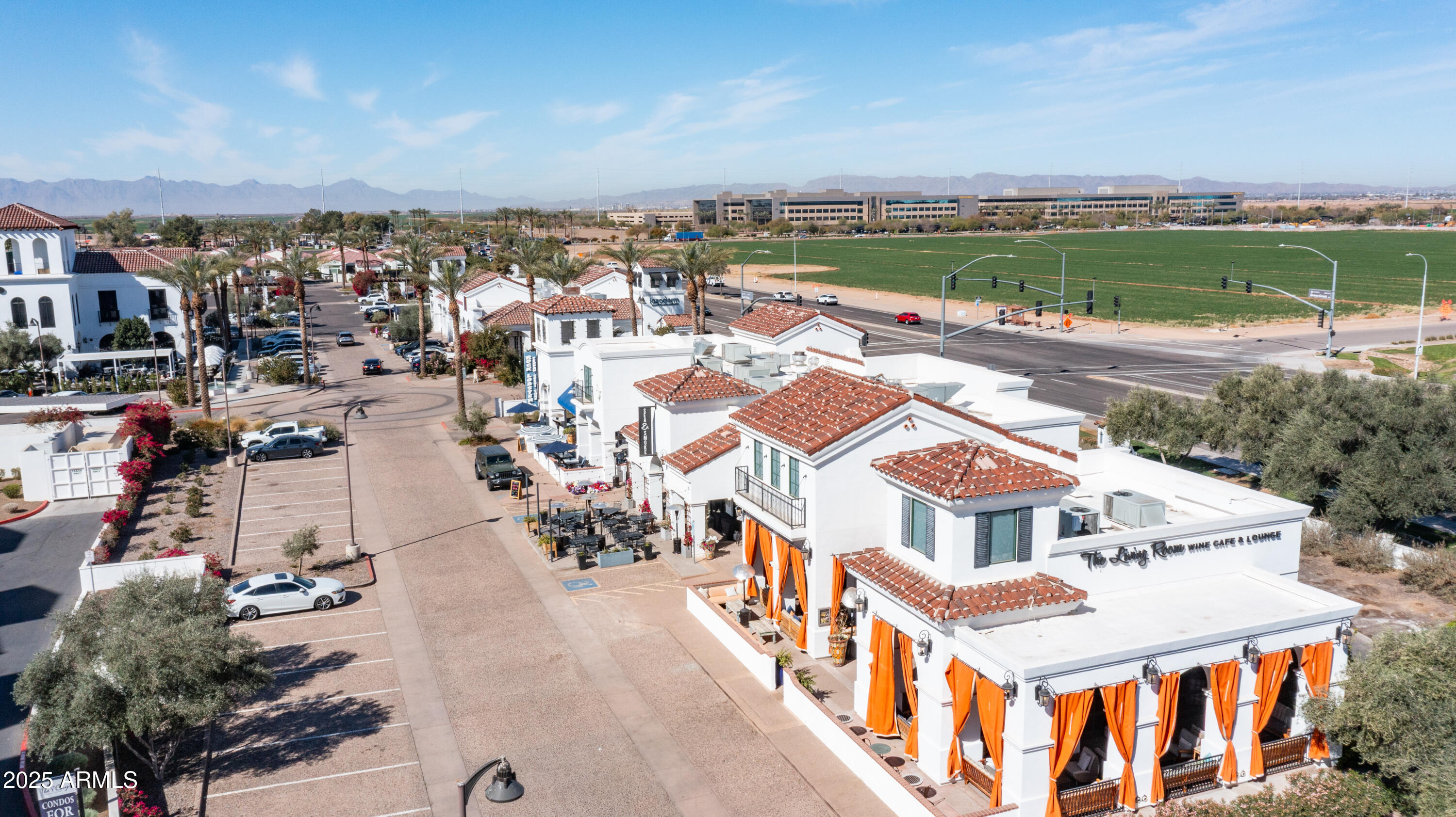 2511 West Queen Creek Road, Unit 166 Chandler, AZ 85248 - Photo 47 of 66 an aerial view of residential houses with outdoor space and ocean view