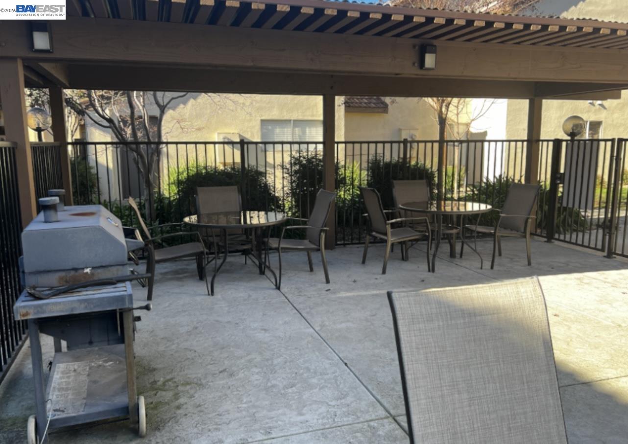 3701 Colonial Drive, Unit 36 Modesto, CA 95356 - Photo 13 of 36 a view of a chairs and table in the balcony