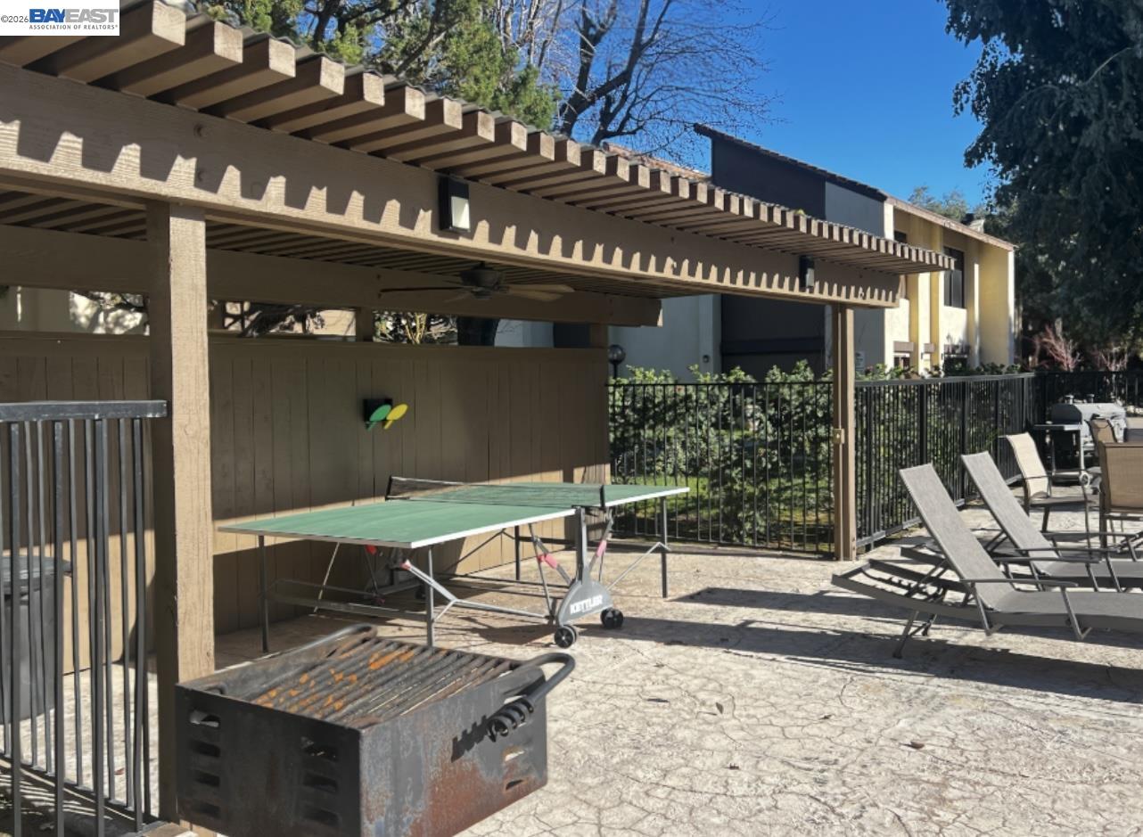 3701 Colonial Drive, Unit 36 Modesto, CA 95356 - Photo 22 of 36 a view of a chairs and table in the patio