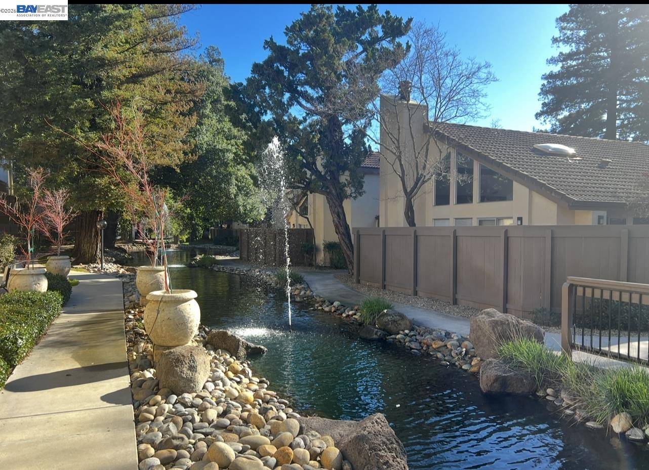 3701 Colonial Drive, Unit 36 Modesto, CA 95356 - Photo 26 of 36 a view of a chair and tables on the patio