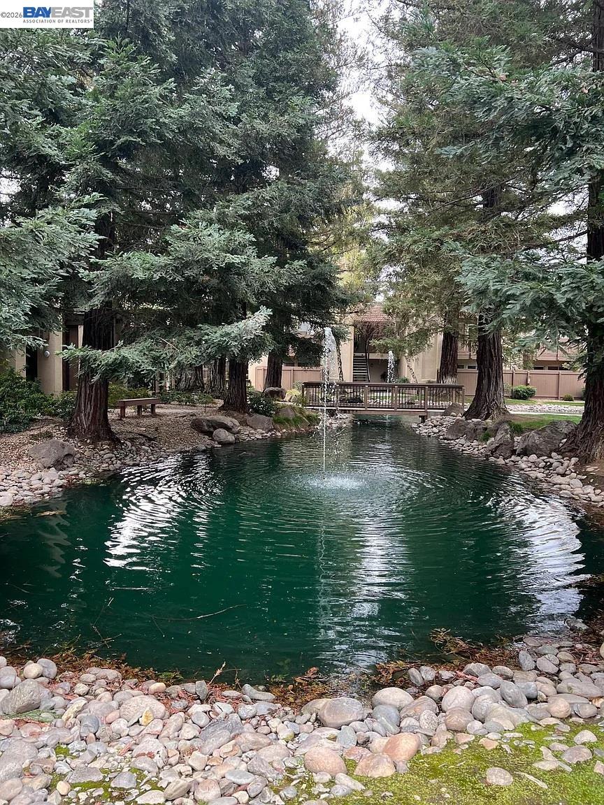 3701 Colonial Drive, Unit 36 Modesto, CA 95356 - Photo 4 of 36 a view of a lake with houses
