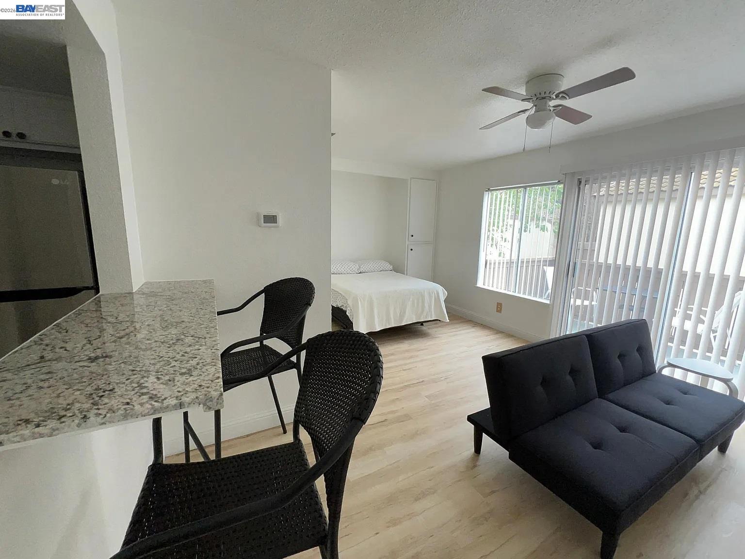 3701 Colonial Drive, Unit 36 Modesto, CA 95356 - Photo 7 of 36 a living room with furniture and a lamp