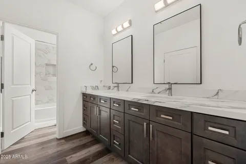 a bathroom with a toilet and a bathtub