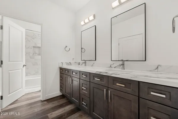 a bathroom with a toilet and a bathtub