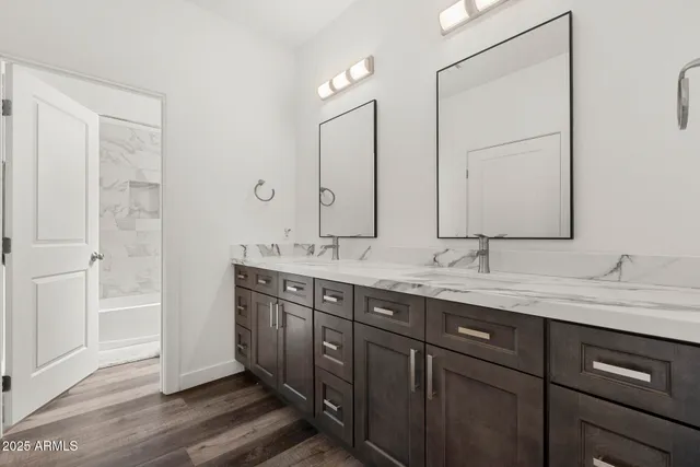 a bathroom with a toilet and a bathtub