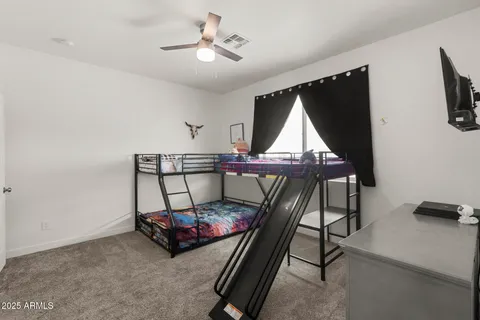 a utility room with sink dryer and washer