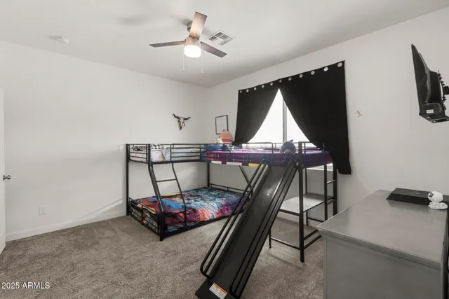 a utility room with sink dryer and washer
