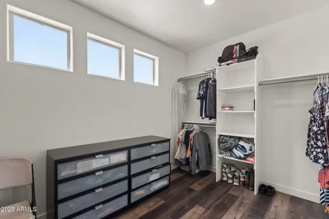 a view of a garage with a bike and a car