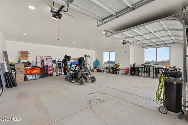a view of a garage with a bike and car