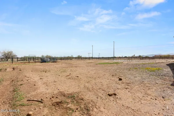 a view of an ocean beach and city