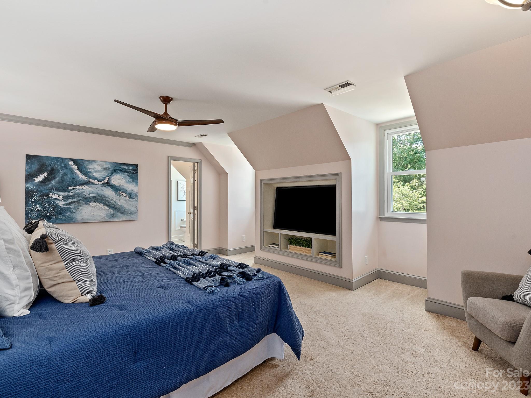 684 Beacon Knoll Lane Fort Mill, SC 29708 - Photo 22 of 46 a living room with furniture and a flat screen tv