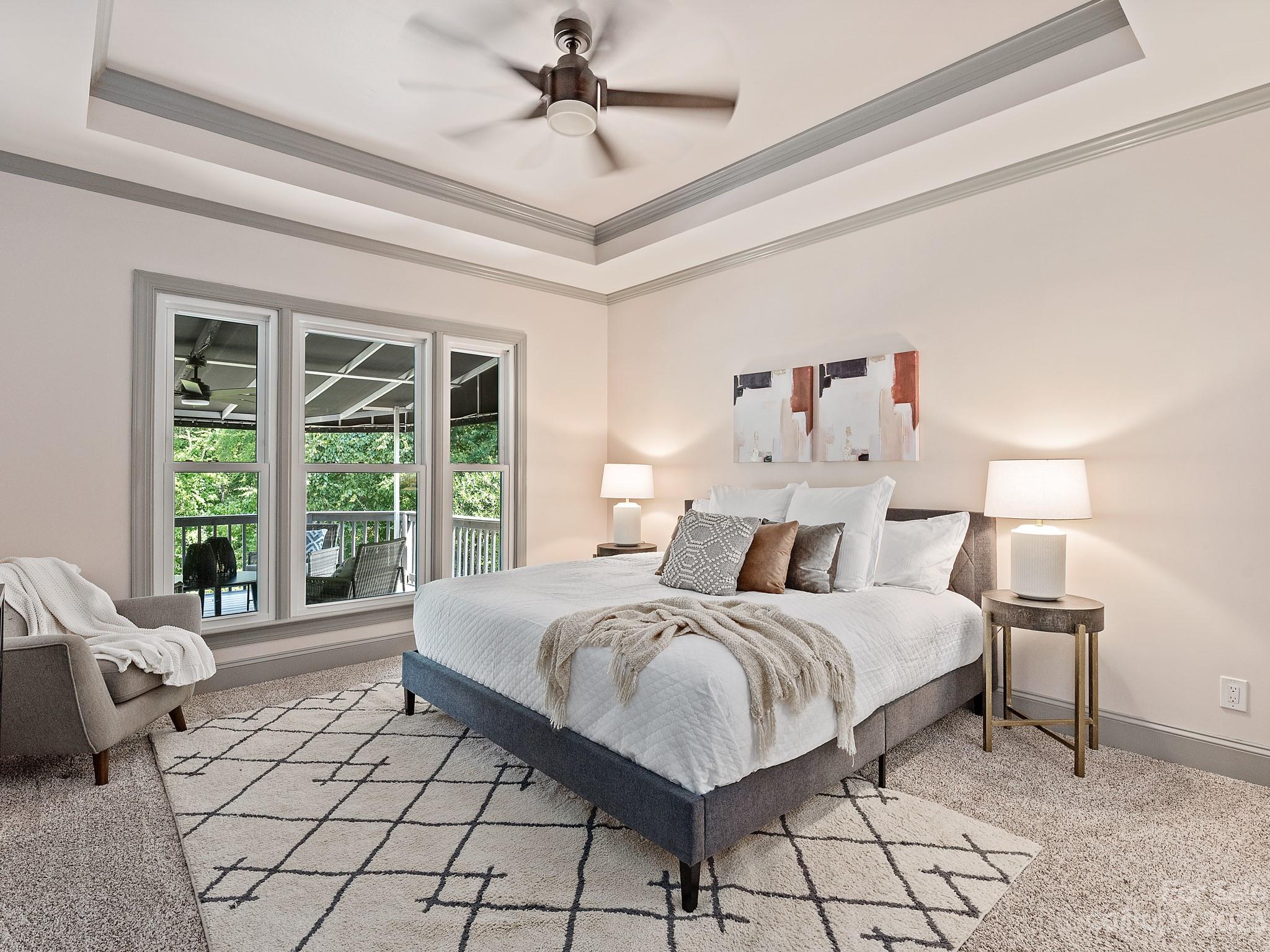 684 Beacon Knoll Lane Fort Mill, SC 29708 - Photo 25 of 46 a bedroom with a bed and a large window