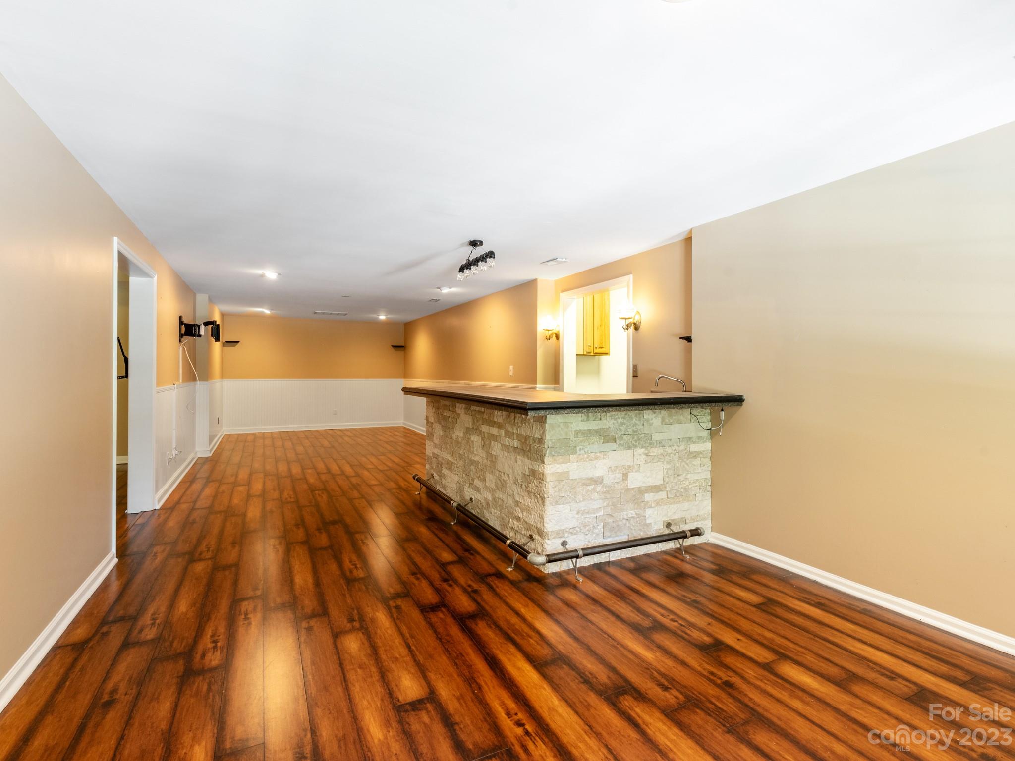 684 Beacon Knoll Lane Fort Mill, SC 29708 - Photo 32 of 46 a view of a room with wooden floor