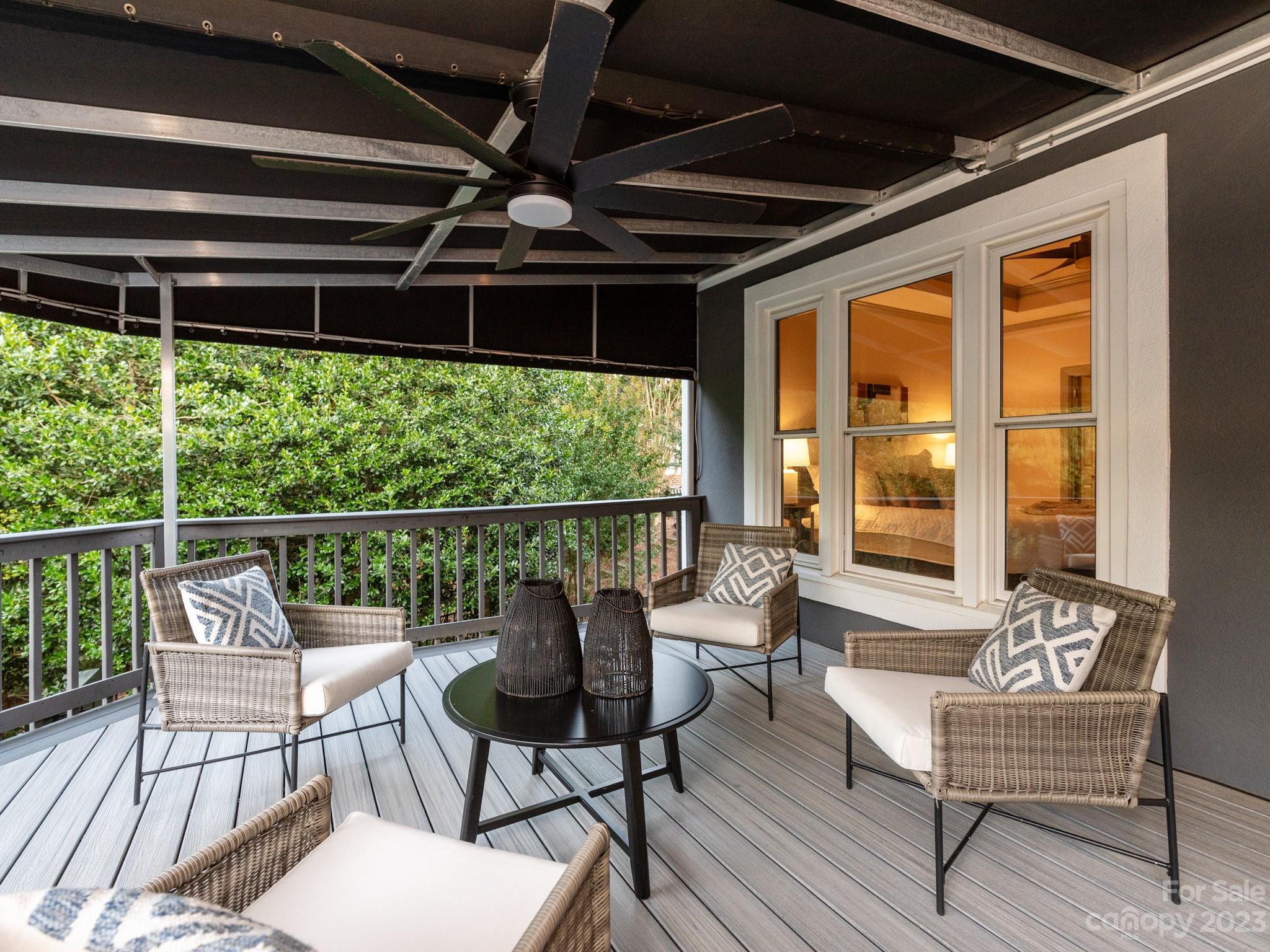 684 Beacon Knoll Lane Fort Mill, SC 29708 - Photo 36 of 46 a balcony with wooden floor and outdoor seating