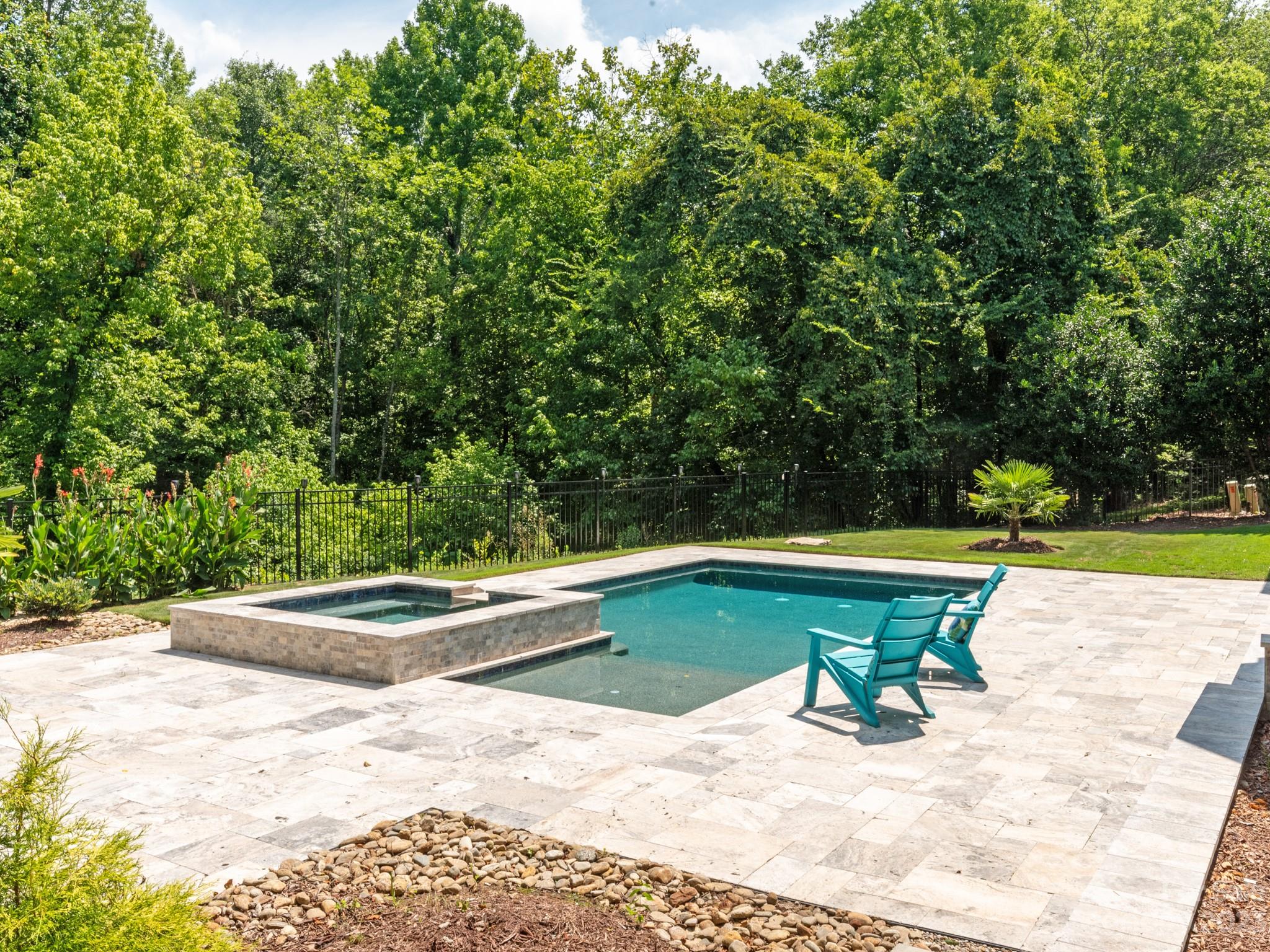 684 Beacon Knoll Lane Fort Mill, SC 29708 - Photo 39 of 46 a view of a swimming pool with an outdoor space and seating area